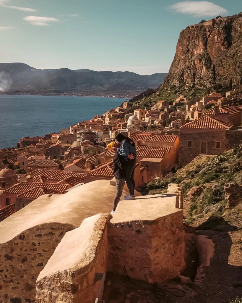 Ari and Benji on a roof in the greek island of Monemvasia